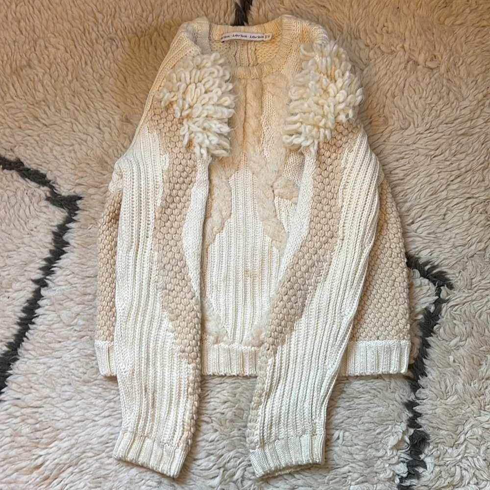 Elegant Cream Sweater with Textured Sleeves